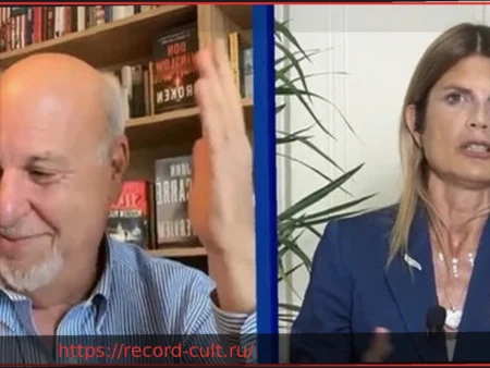 Лаура Раветто и Алан Фридман: жаркий спор в студии «L’Aria Che Tira»
